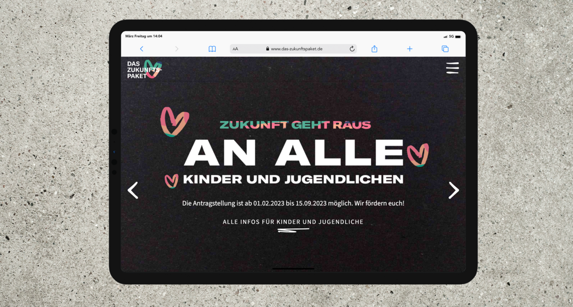 Ansprachebild auf der Website www-zukunftspaket.de auf einem Tablet